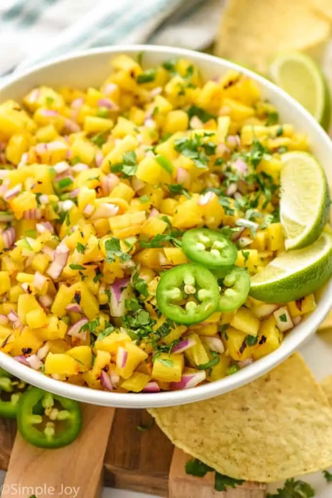 side view of a bowl of pineapple salsa