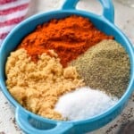 a small dish with paprika, brown sugar, salt, and pepper in it - 12