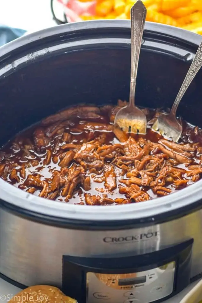 slow cooker pulled pork in a crock pot