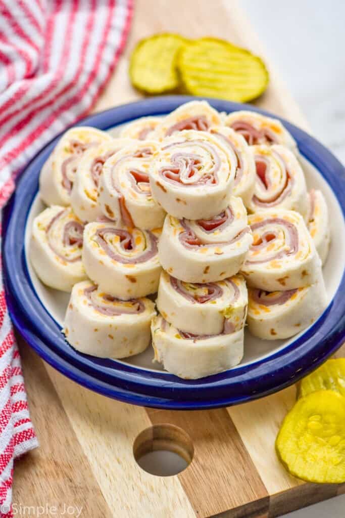 a plate of ham and cheese pinwheels