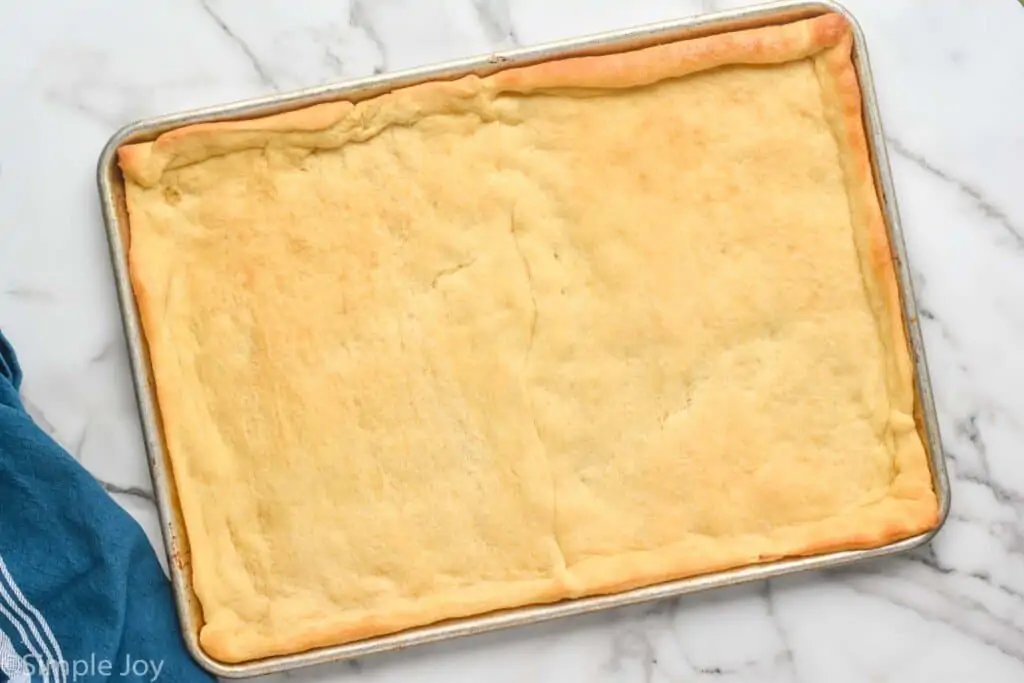 crescent roll dough that has been spread into a baking sheet and baked