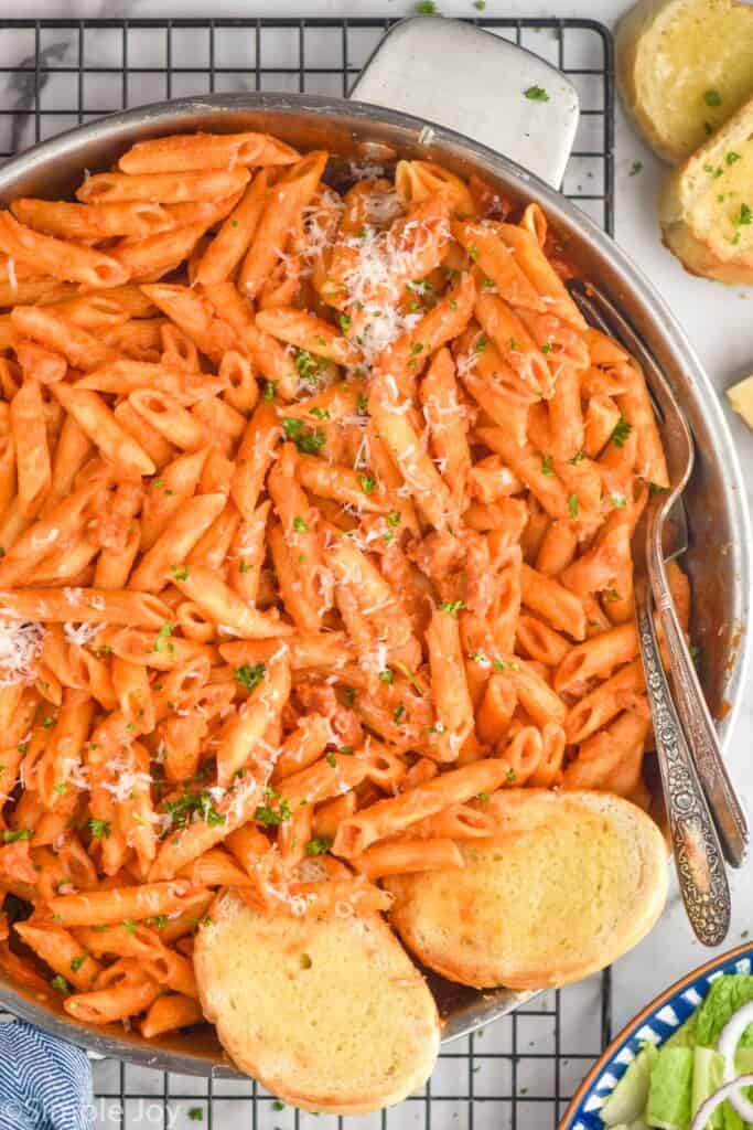 overhead ove a skillet full of penne Alla vodka recipe