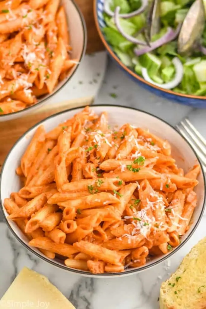 small bowl full of noodles in penne Alla vodka sauce