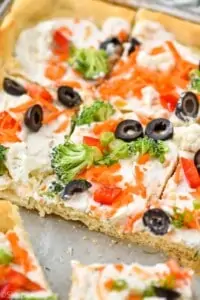 close up of a veggie pizza recipe in a baking sheet