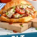 pinterest graphic of blt chicken salad sandwich on a croissant