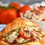 pinterest graphic of blt chicken salad sandwich on a croissant