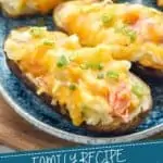 pinterest graphic of close up of a crab twice baked potato on a plate