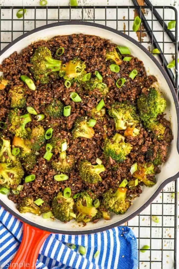 overhead of a beef and broccoli stir fry in a frying pan