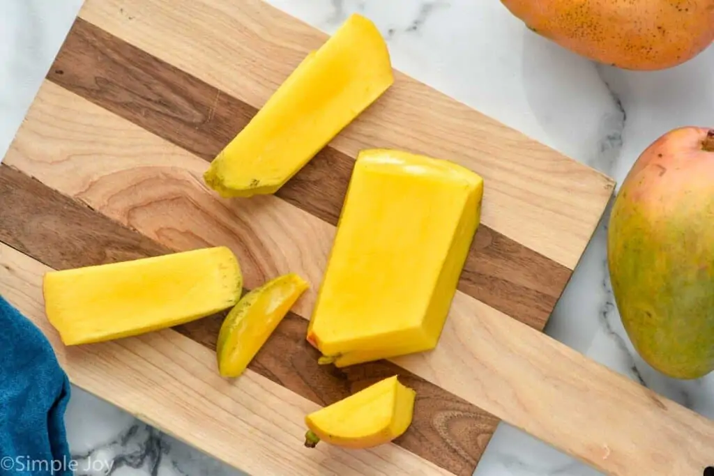 a mango being cut up