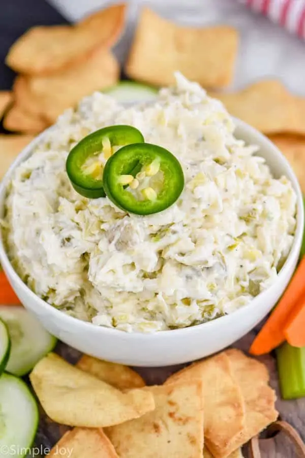 jalapeno artichoke dip in a small white bowl