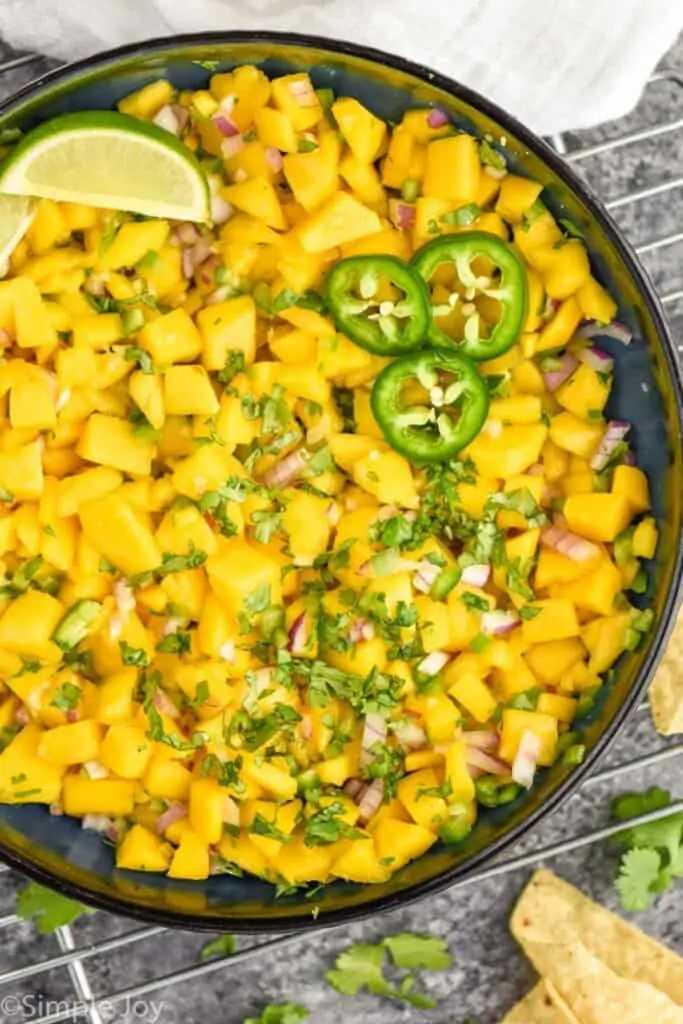 overhead of a bowl of mango salsa