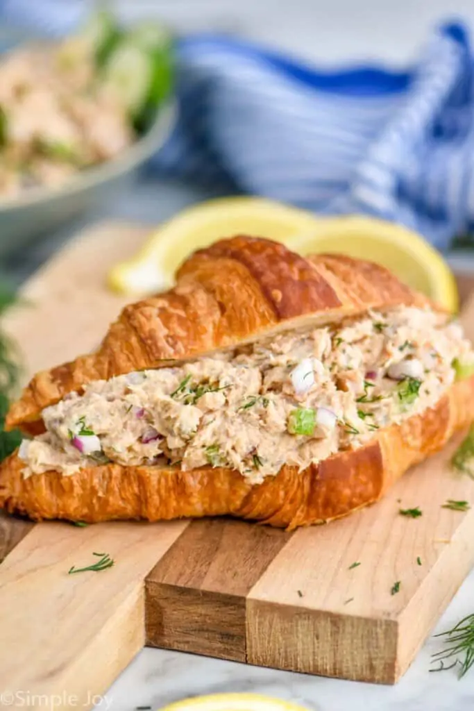 salmon salad sandwich on a croissant