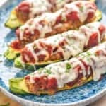 four zucchini boats on a plate - 13
