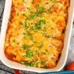 pinterest graphic of overhead of black bean enchiladas in a baking dish