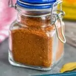 Pinterest graphic of homemade old bay seasoning in a small jar