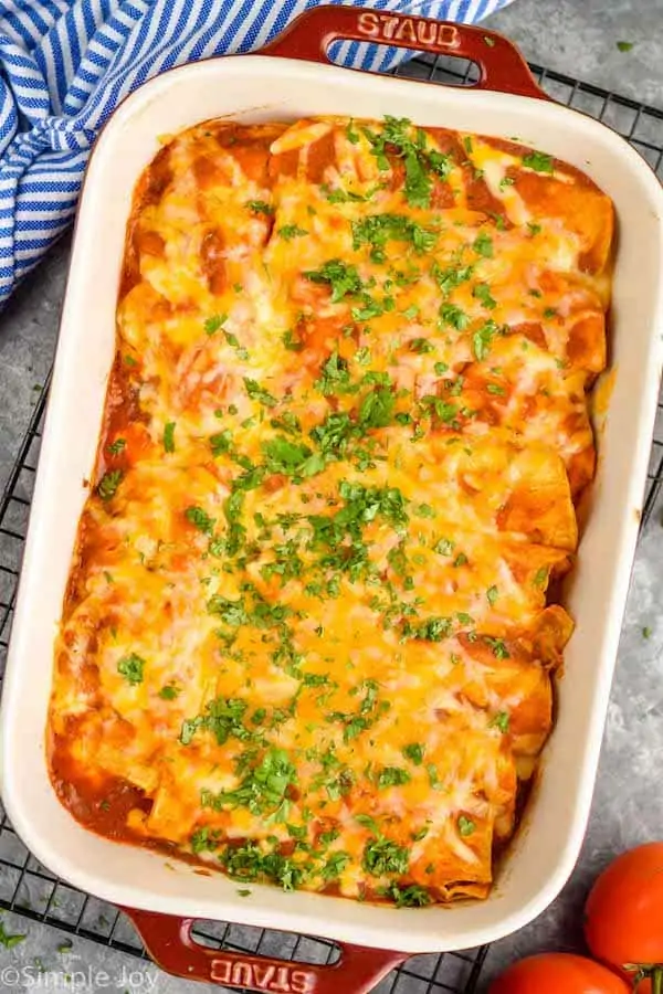 overhead of black bean enchiladas in a baking dish