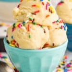 a small bowl filled with scoops of edible sugar cookie dough - 8