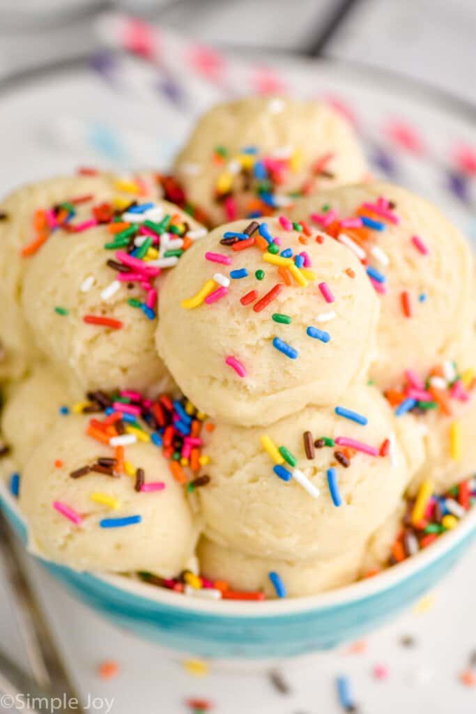sugar cookie dough in a bowl with sprinkles on top