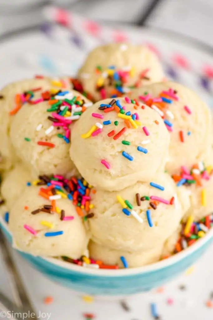 sugar cookie dough in a bowl with sprinkles on top