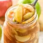pinterest graphic of apple pie filling being spooned out of a large mason jar