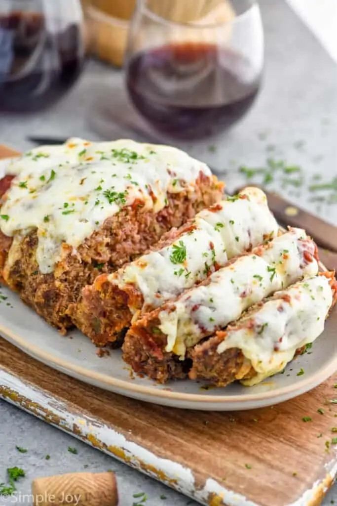 italian meatloaf recipe cut up on a platter