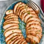 pinterest graphic of turkey tenderloin sliced and on a platter