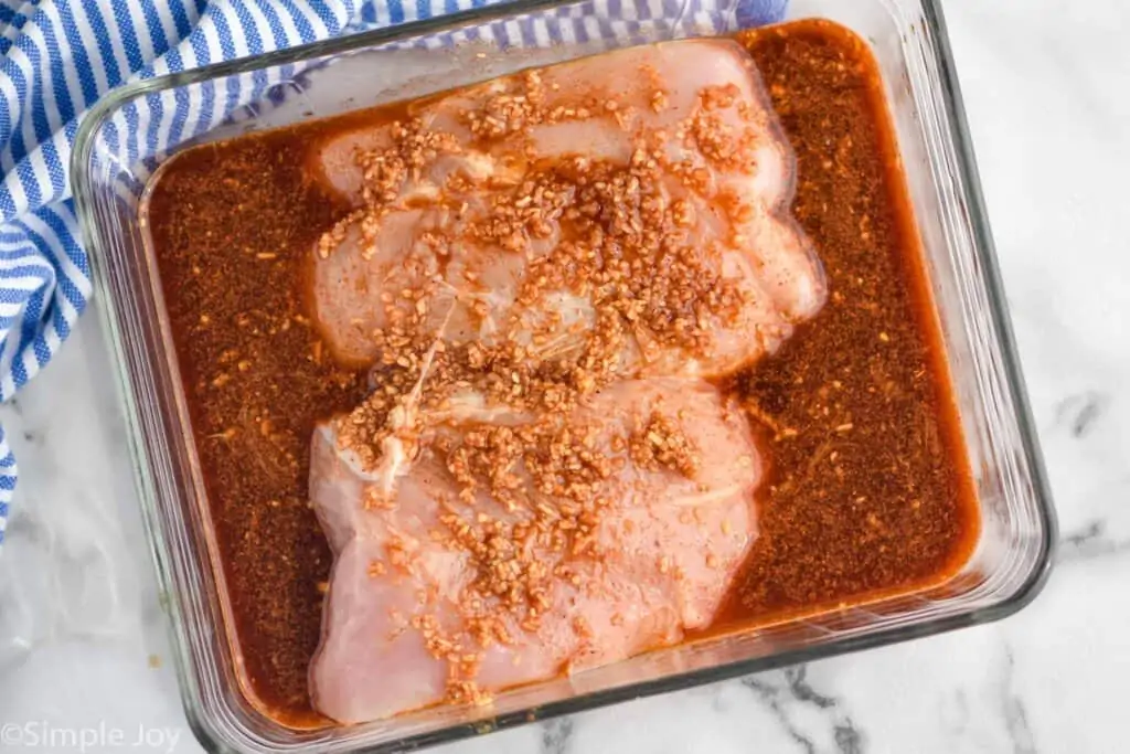 overhead of a turkey breast tenderloin sitting in a marinade