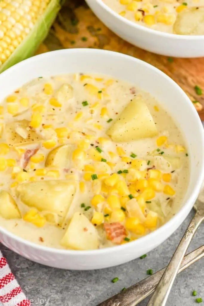 side view of a bowl of corn and potato chowder