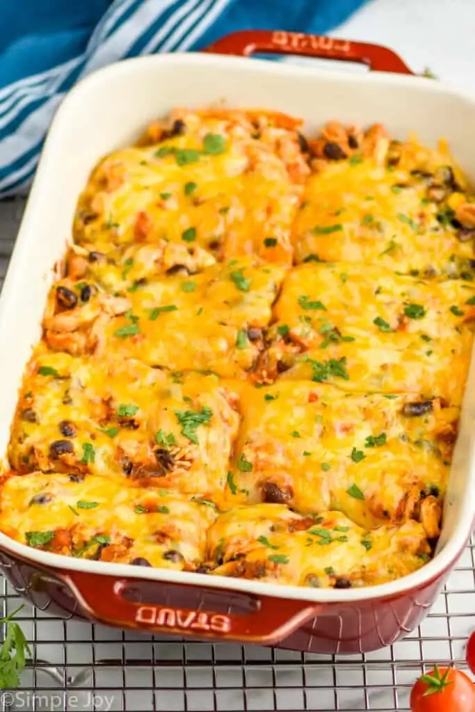 side view of a baking dish with easy chicken enchilada casserole