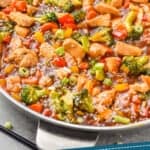 pinterest graphic of a skillet full of chicken stir fry recipe