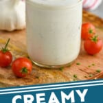Pinterest graphic of a spoon drizzling creamy garlic dressing into a mason jar