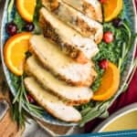 pinterest graphic of overhead of a platter of crockpot turkey breast and gravy