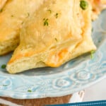 pinterest graphic of close up of a mini chicken pot pie on a platter