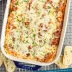 pinterest graphic of overhead of a baking dish full of turkey lasagna