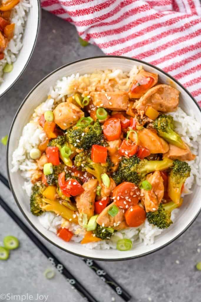 overhead of a bowl of chicken stir fry with rice