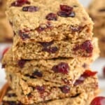 a stack of cranberry oatmeal bars - 13