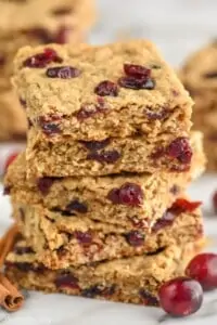 a stack of cranberry oatmeal bars