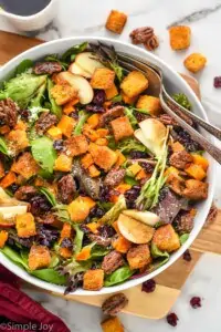 overhead of a bowl full of fall harvest salad recipe