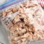 overhead of a ziplock bag full of frozen rotisserie chicken - 8
