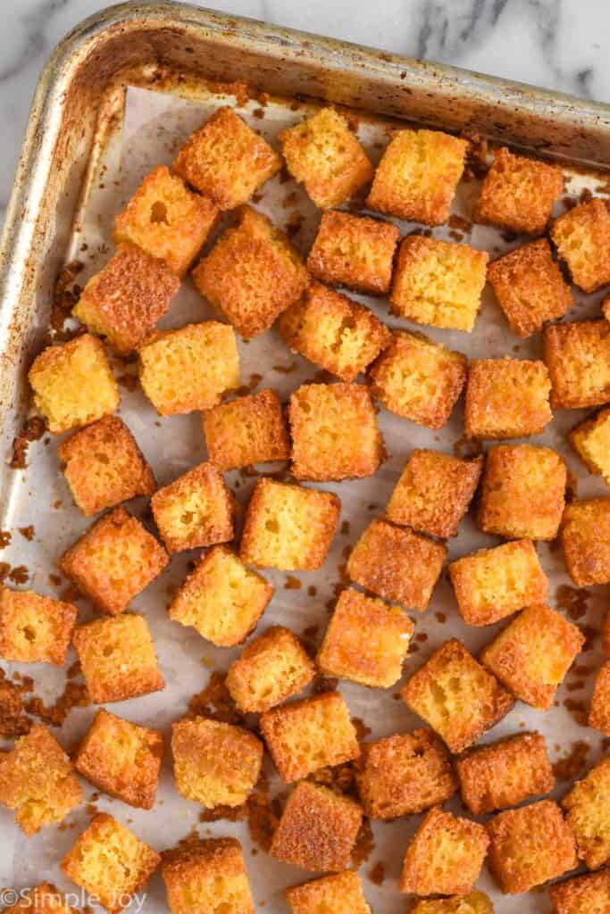 baking sheet with cornbread croutons recipe on it