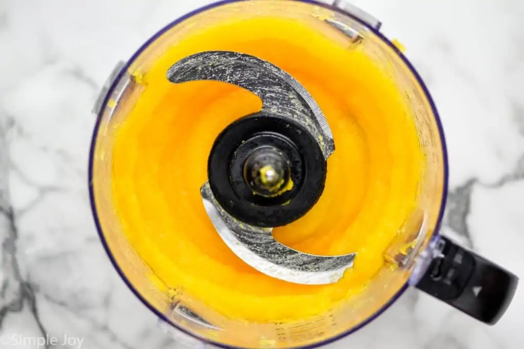 overhead of a pumpkin that has been pureed in a food processor