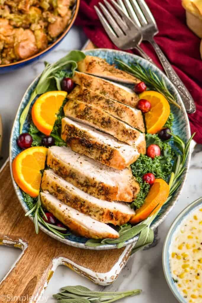 sliced turkey breast recipe on a platter