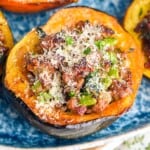 close up side picture of a stuffed acorn squash - 8