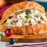 pinterest graphic a turkey salad sandwich on a cutting board