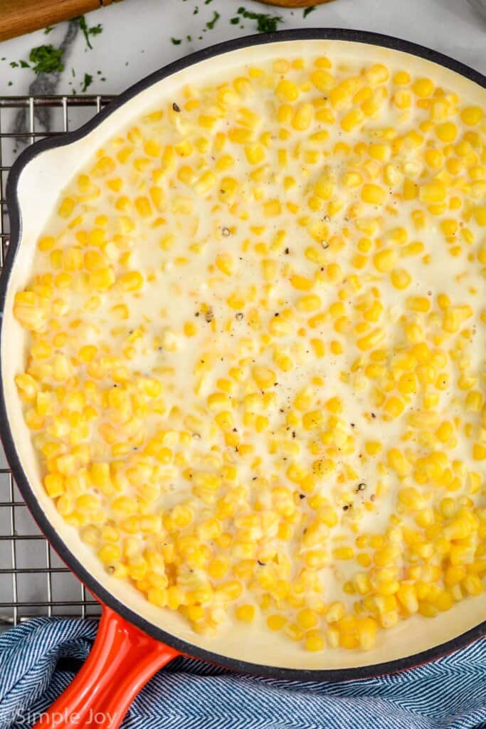 overhead of a skillet full of creamed corn
