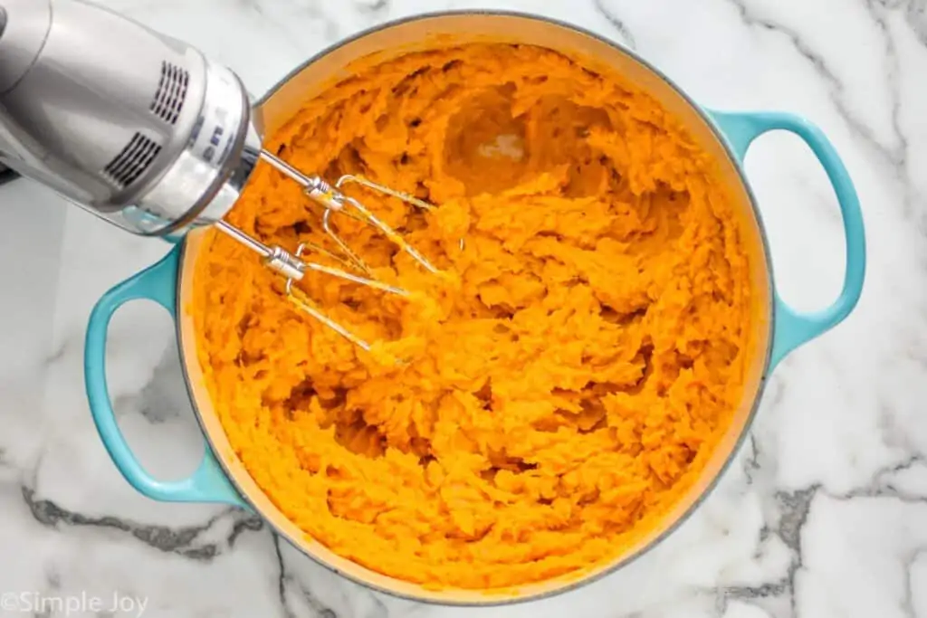 overhead of a bowl dutch oven full of mashed sweet potato recipe