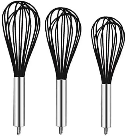 three metal whisks of different sizes with black silicon whisk part