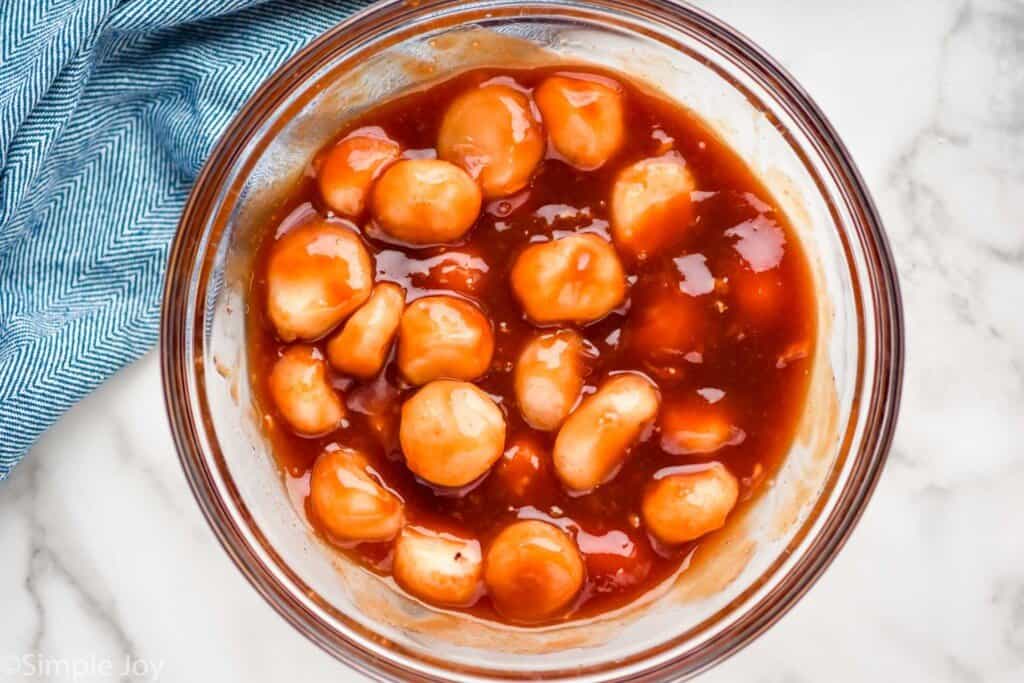 overhead view of water chestnuts soaking in sauce