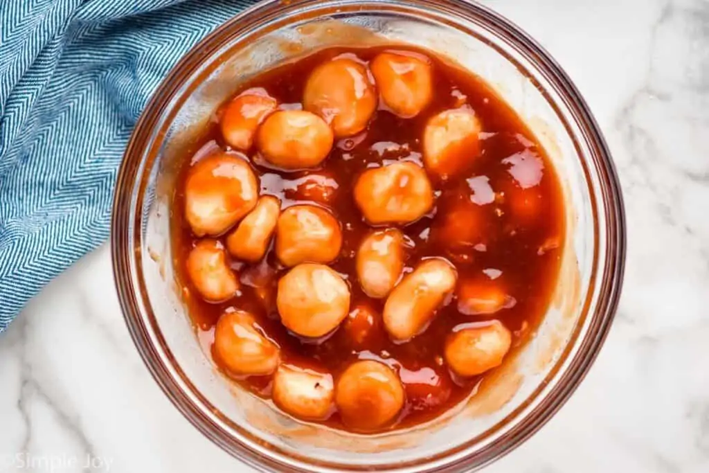 overhead view of water chestnuts soaking in sauce