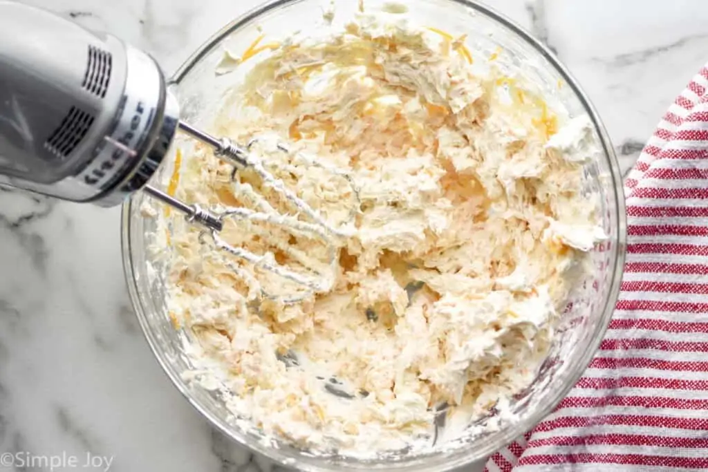 overhead of a bowl of ingredients for a cheese ball recipe blended in a bowl